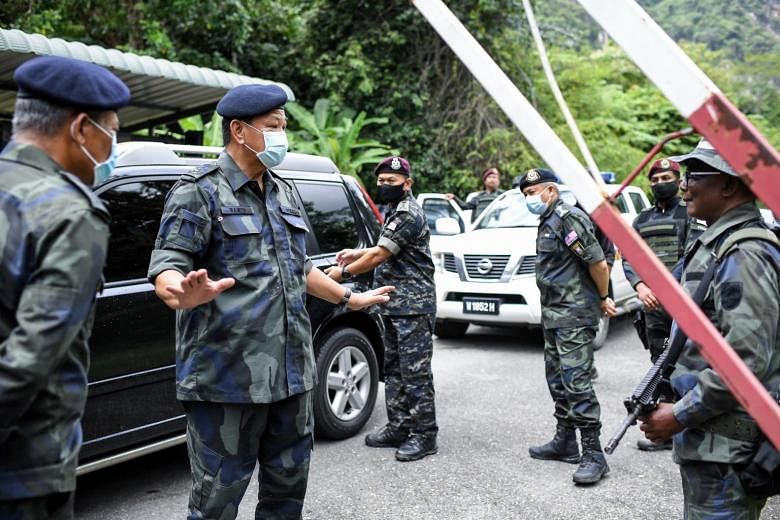Malaysia menahan 18 tersangka setelah baku tembak mematikan dengan polisi di perbatasan Perlis-Thailand